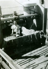 Jean and The Captain in swimming pool on the freighter Braga Feb 1941.jpg